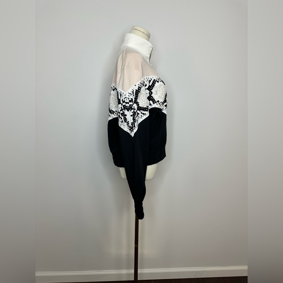 MAJE
Thelo zipped python-print sports-jersey jacket - Picture 13 of 14